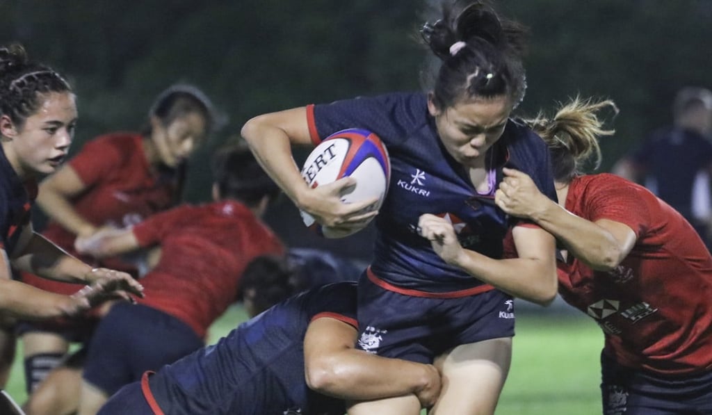 Agnes Chan Tsz-ching is hit hard as Hong Kong training ramps up as the World Cup looms.