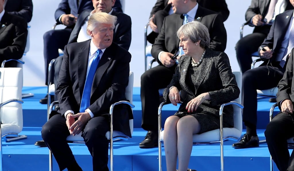 US President Donald Trump and Britain's Prime Minister Theresa May attend a ceremony during the NATO (North Atlantic Treaty Organisation) summit at NATO headquarters, in Brussels. May complained to Trump about leaks in the US on the suicide bombing in Manchester. Photo: AFP
