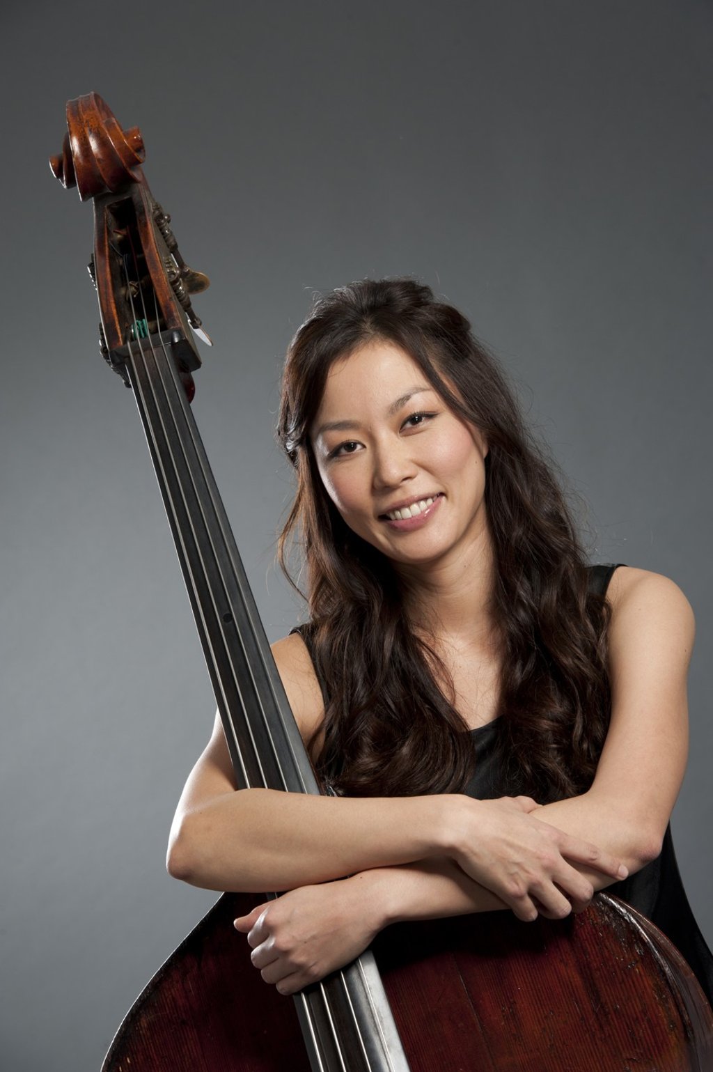 Masami Nagai plays the double bass, one of two instruments that represent the minister/poet Qu Yuan in The Beat of the Dragon Boat. Masami Nagai plays the double bass, one of two instruments that represent the minister/poet Qu Yuan in The Beat of the Dragon Boat.