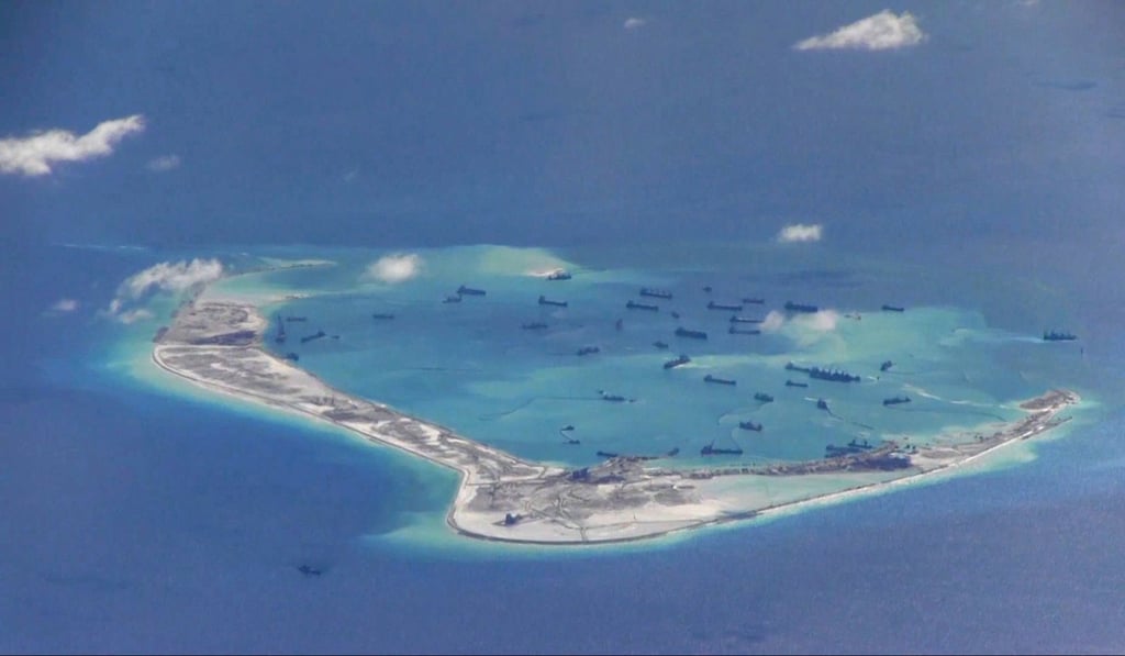 Chinese dredging vessels seen in Mischief Reef in May 2015. Photo: Handout