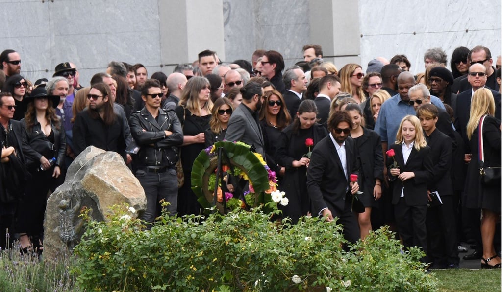 Guests pay their respects at the grave site of Soundgarden frontman Chris Cornel. Photo: AFP Guests pay their respects at the grave site of Soundgarden frontman Chris Cornel. Photo: AFP