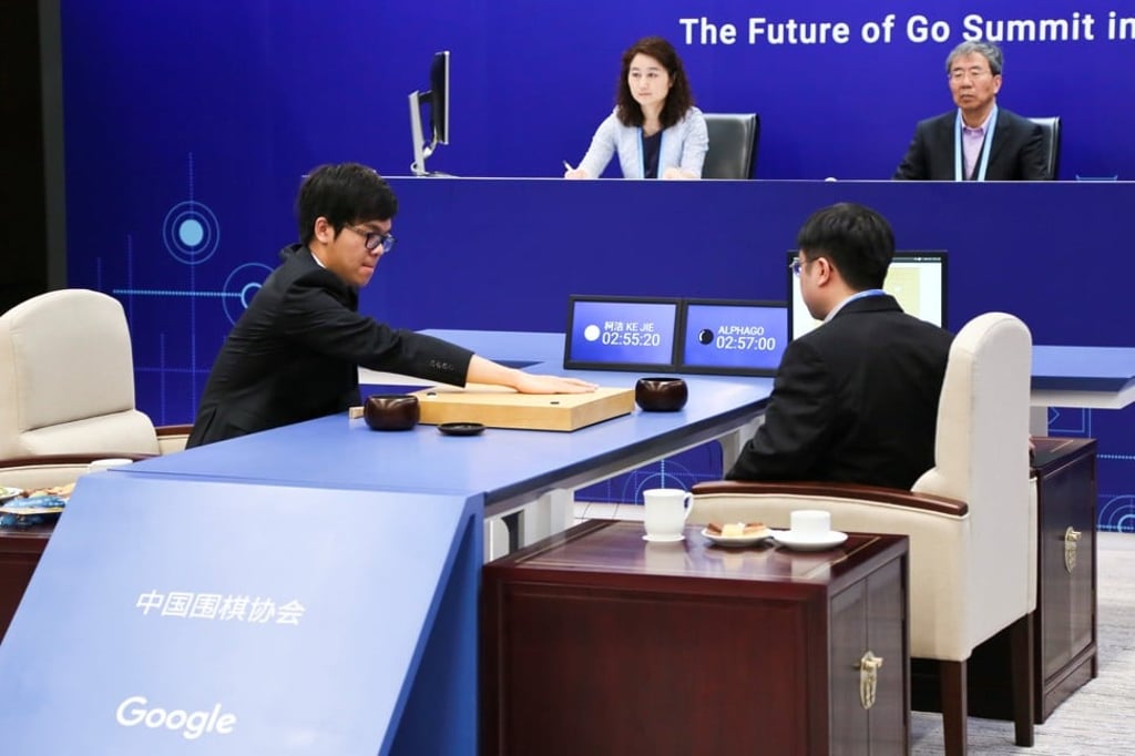 Ke Jie puts a stone against the AlphaGo programme during their second match on Thursday. Photo: Reuters