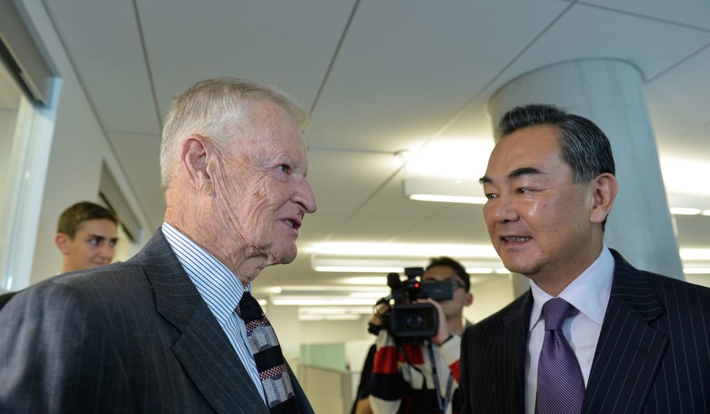 Foreign Minister Wang Yi with Zbigniew Brzezinski in Washington in 2014. Photo: Xinhua