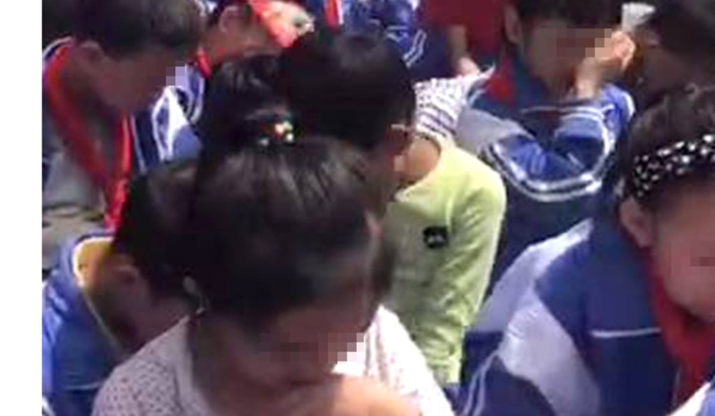 Some of the children weeping openly during Ouyang’s presentation. Photo: Handout