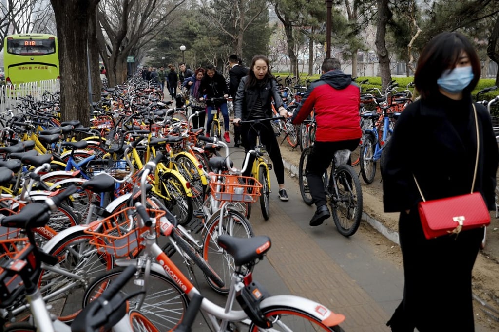 China’s bicycle-sharing model, where users can pick up their rides anywhere and leave them anywhere, usually for as little as 1 yuan per hour, is taking the country by storm. Photo: AP