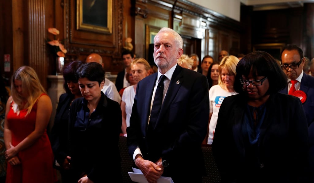 Jeremy Corbyn, the leader of Britain's opposition Labour party, observes a minute's silence for the victims of the attack on the Manchester Arena before making a speech as his party restarts its election campaign in London on May 26,. Photo: Reuters