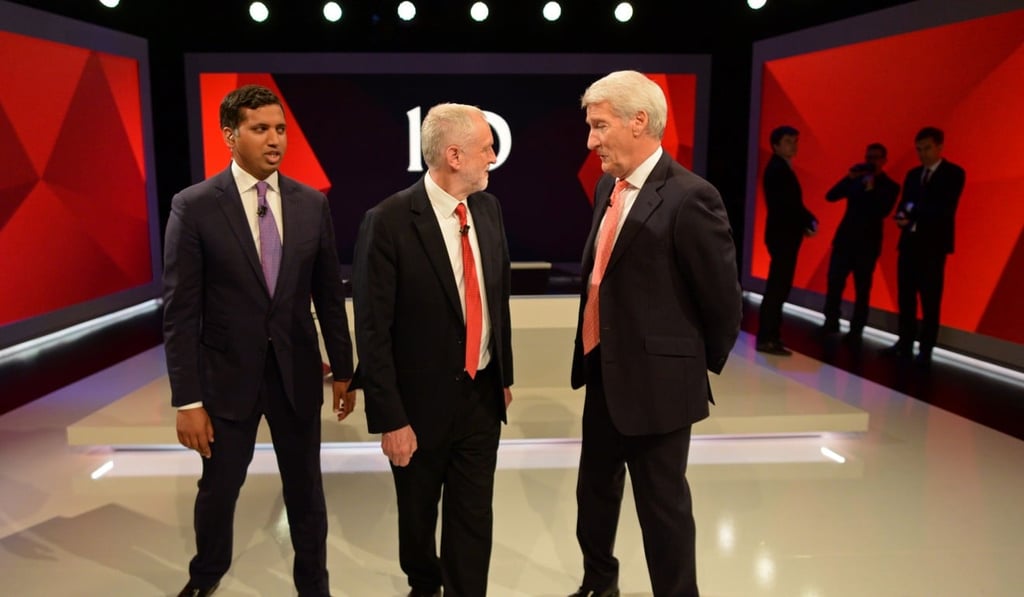 British Labour Party leader Jeremy Corbyn (centre) speaks with Faisal Islam, Sky News’ Political Editor (left) and Channel 4’s Jeremy Paxman (right) as he takes part in an election broadcast in London. Photo: AFP