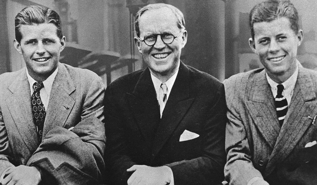 In this 1938 file photo, John F Kennedy, right, poses aboard an ocean liner with his father Joseph P Kennedy, centre, US Ambassador to Great Britain, and brother Joseph P Kennedy Jr, left. Monday, May 29, 2017 marks the 100-year anniversary of the birth of John F Kennedy, who went on to become the 35th President of the United States. Photo: AP