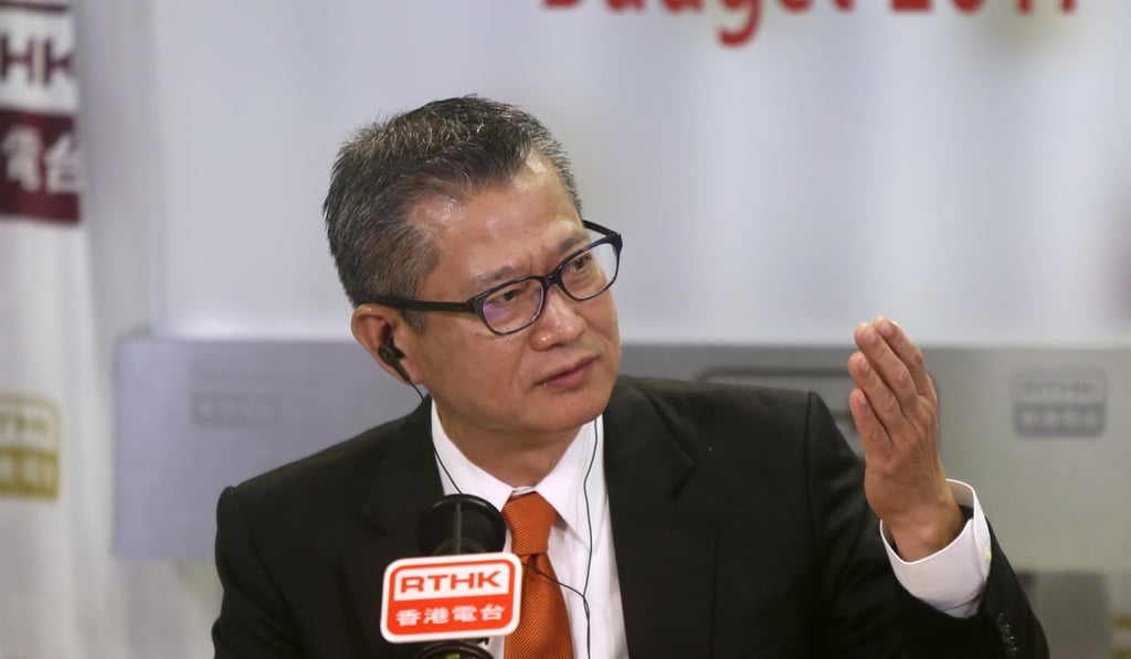 Financial Secretary Paul Chan discusses his budget on an RTHK radio programme in Kowloon Tong, on February 24. Photo: Xiaomei Chen