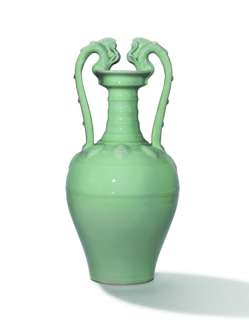 A celadon-glazed “double dragon” amphora from the Qing dynasty reign of Emperor Yongzheng became the most expensive monochrome Chinese porcelain piece sold at auctions when it went for HK$140.5 million. Photo: Christie’s