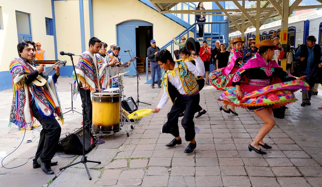 Local native musicians and dancers in traditional costumes welcome guests of the Andean Explorer. Photo: Marco Ruiz Local native musicians and dancers in traditional costumes welcome guests of the Andean Explorer. Photo: Marco Ruiz