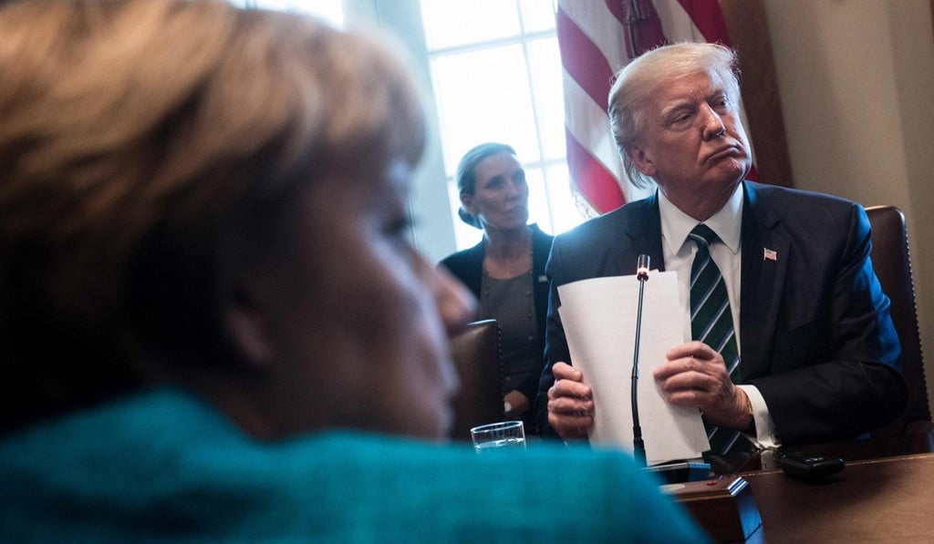 Angela Merkel and Donald Trump before a meeting with German and US business leaders in the White House. Photo: AFP