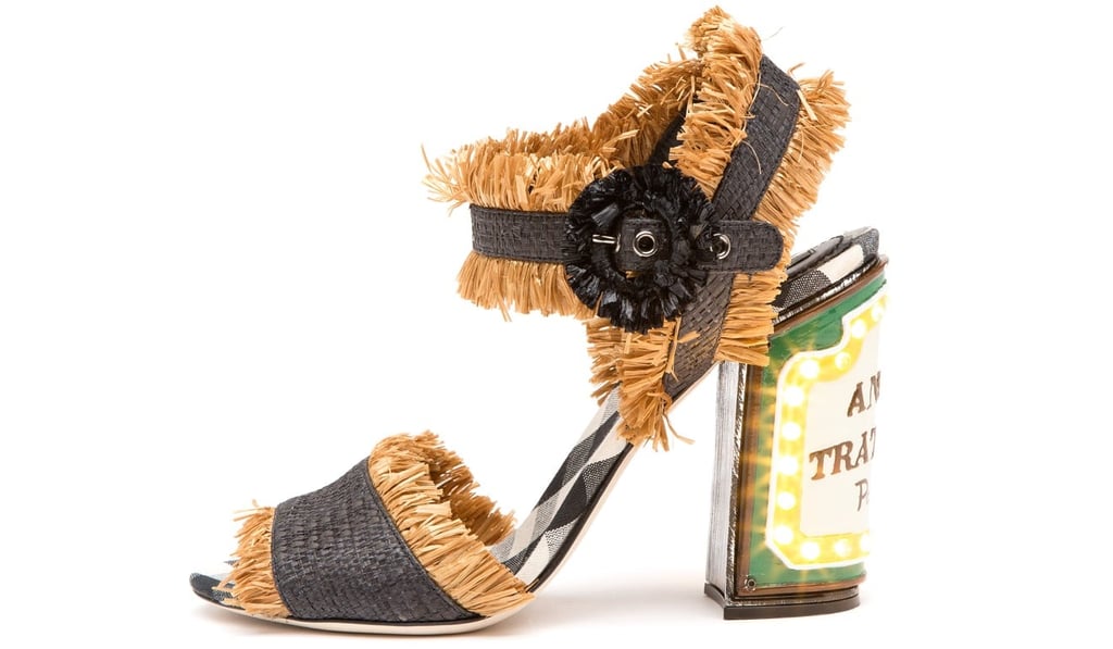 The sculptural heels with bright LEDs literally light up your outfit. Price on request