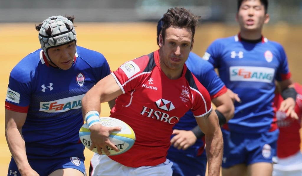 Tyler Spitz charges forward for Hong Kong in their convincing win over South Korea in the Asia Rugby Championship. Photo: Kenji Demura