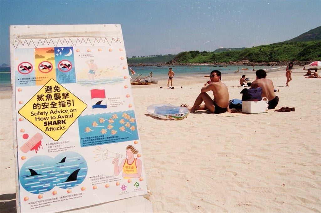 A shark sighting kept sunbathers and swimmers on dry land at Clear Water Bay in 1993. Photo: SCMP