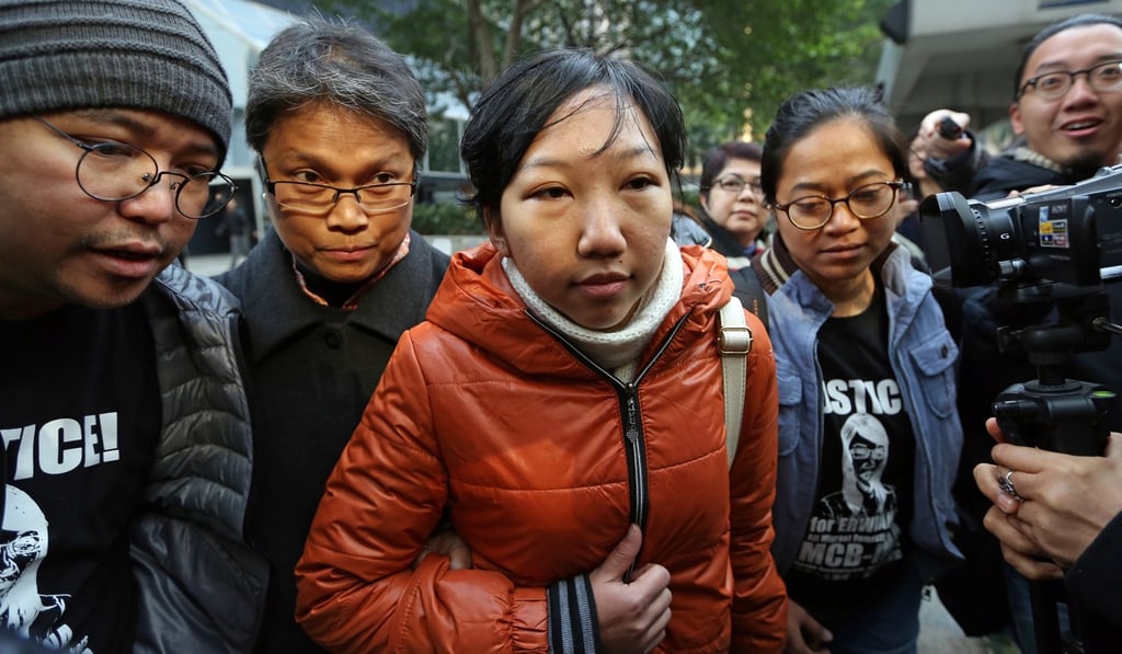 Indonesian domestic worker Erwiana Sulistyaningsih (centre) was abused and beaten by her employer. Photo: Sam Tsang