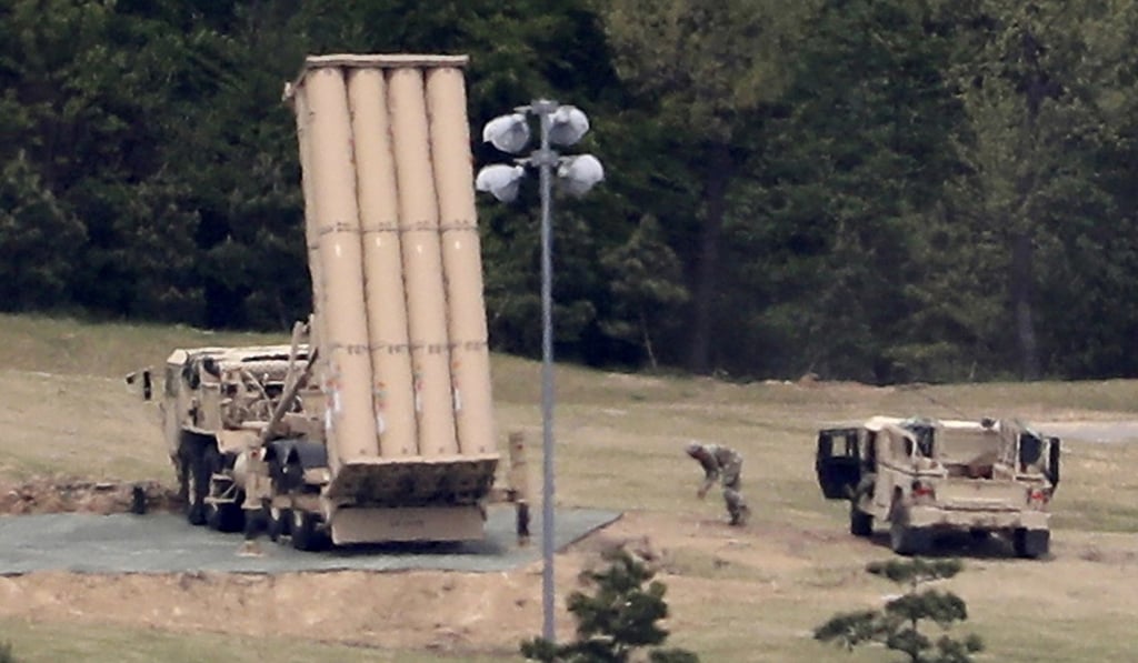 US soldiers install a THAAD launcher on a golf course in Seongju, South Korea. President Moon Jae-in has claimed to be shocked that four more launchers – in addition to two already in the country – have been imported. Photo: AP