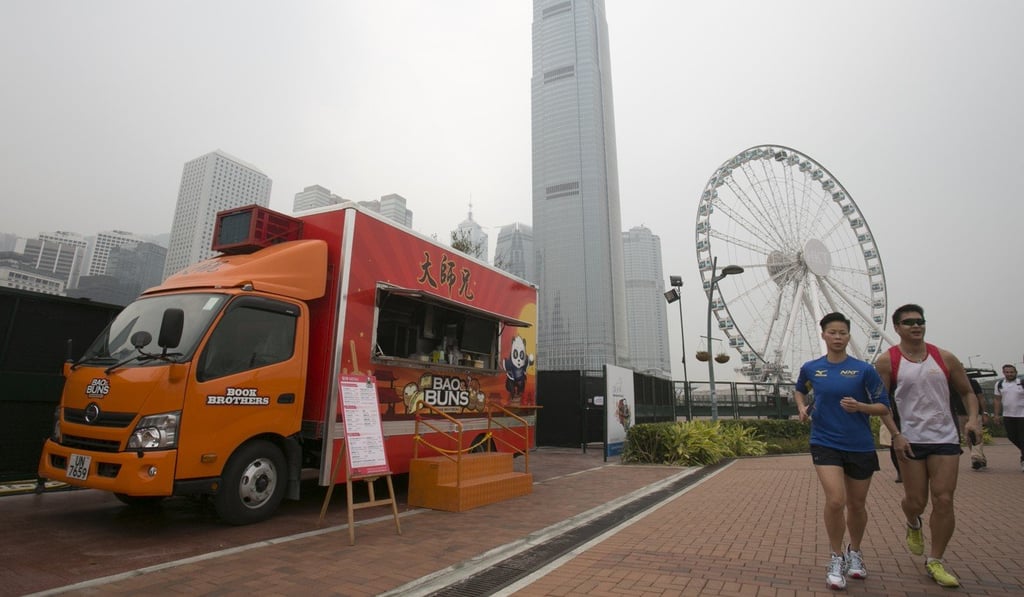 A food truck is parked at Central Harbourfront in Central. Why can’t the trucks move to where the demand for their products is, which may be different at different times of day? Photo: May Tse