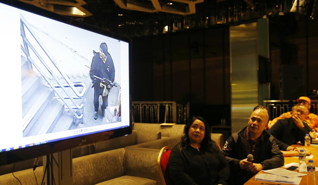 Police and Resorts World Manila complex security play CCTV video of the gunman. Photo: AP