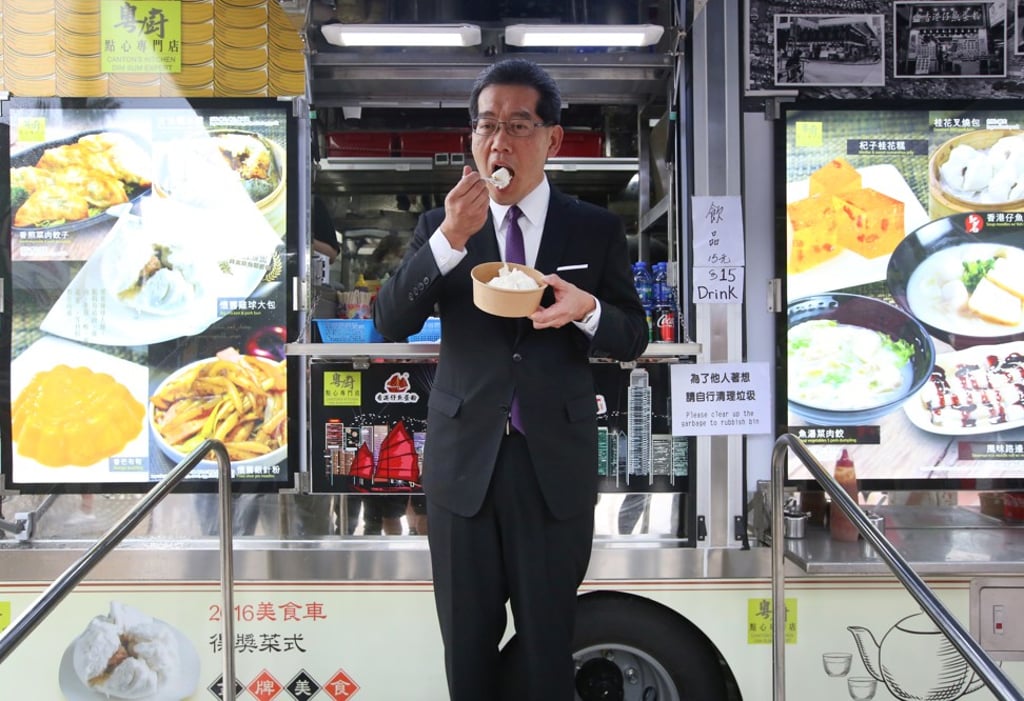 Gregory So visits a food truck at Hong Kong Disneyland, the only location where operators are turning a profit, on April 20. Photo: Sam Tsang