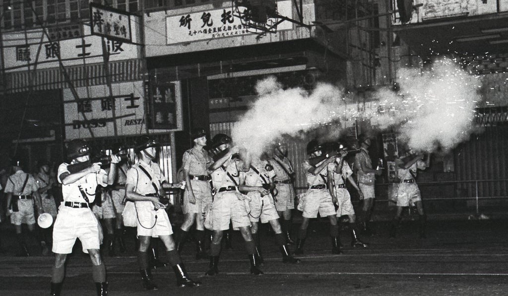 Police shoot tear gas to disperse troublemakers in North Point in 1967. Photo: SCMP