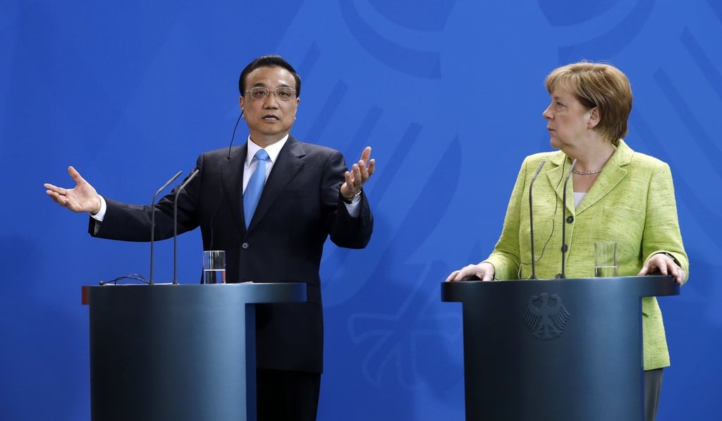 Premier Li Keqiang speaks at a joint press conference with German Chancellor Angela Merkel in Berlin, on June 1. Photo: EPA Premier Li Keqiang speaks at a joint press conference with German Chancellor Angela Merkel in Berlin, on June 1. Photo: EPA