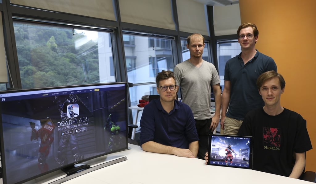 Cmune staff at their office in Cyberport: (front row from left) Shaun Lelacheur-Sales and Kostya Plutenko, (back row, from left) Matti Lamberg and Lee Turner. Photo: Rachel Cheung