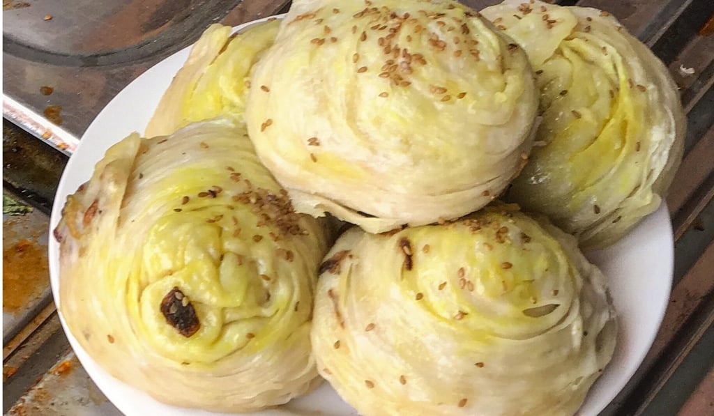 Multilayered steamed buns at a bazaar n Hotan.