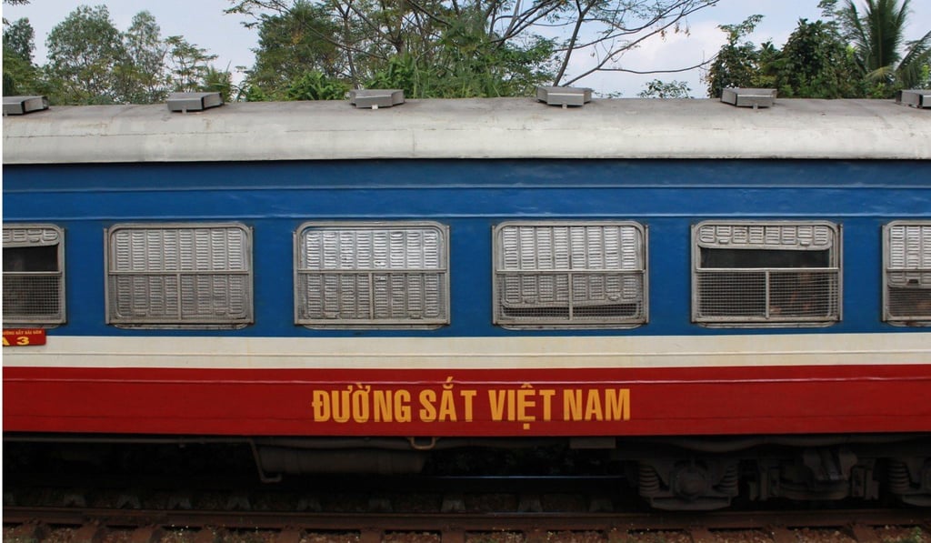 A passing carriage of the Unification Express train in Vietnam. Photo: Samuel Bergstrom