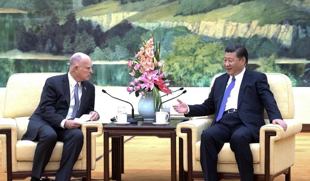 President Xi Jinping meets California Governor Jerry Brown at the Great Hall of the People in Beijing, on June 6. China and California have signed an agreement to work together on reducing carbon emissions. Photo: Xinhua