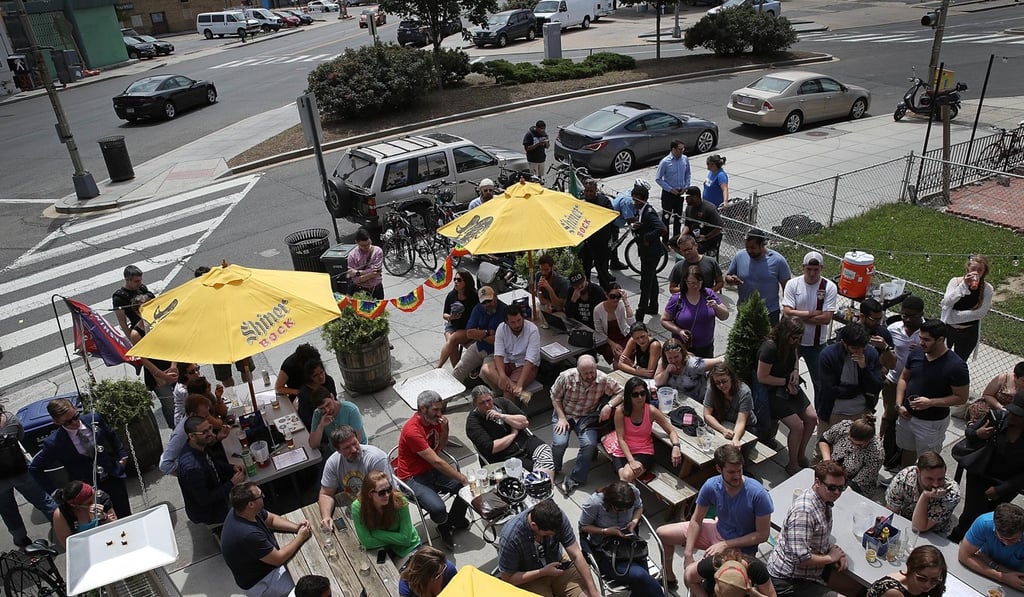 An overflow crowd at Duffy's Irish Restaurant and Bar gather to watch former FBI Director James Comey testify before the Senate Intelligence Committee June 8, 2017 in Washington, DC. Photo: AFP An overflow crowd at Duffy's Irish Restaurant and Bar gather to watch former FBI Director James Comey testify before the Senate Intelligence Committee June 8, 2017 in Washington, DC. Photo: AFP
