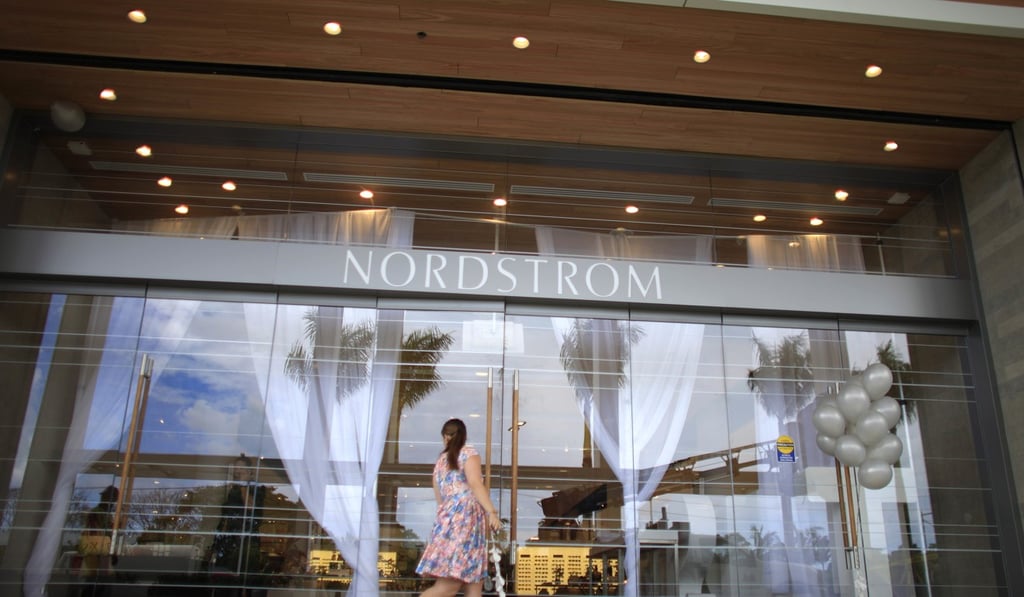 A woman arrives at a Nordstrom luxury department store, at The Mall of San Juan, in San Juan, Puerto Rico. Members of Nordstrom stores' founding family, including some top executives, say they're considering buying out the 70 per cent of the chain they don't already own and are considering going private. Photo: AP