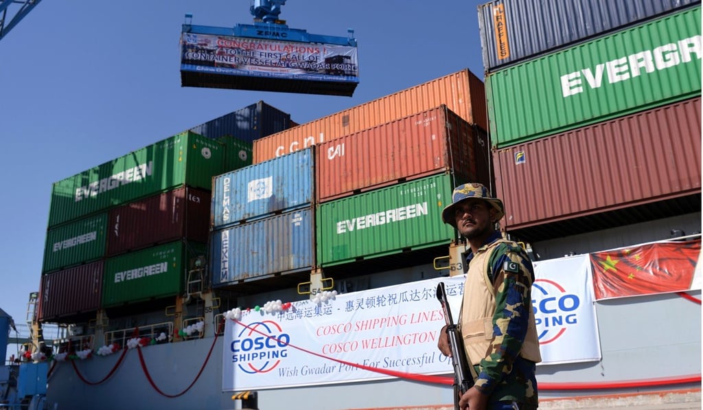 A Pakistani soldier guards a ship at Gwadar port. Photo: AFP
