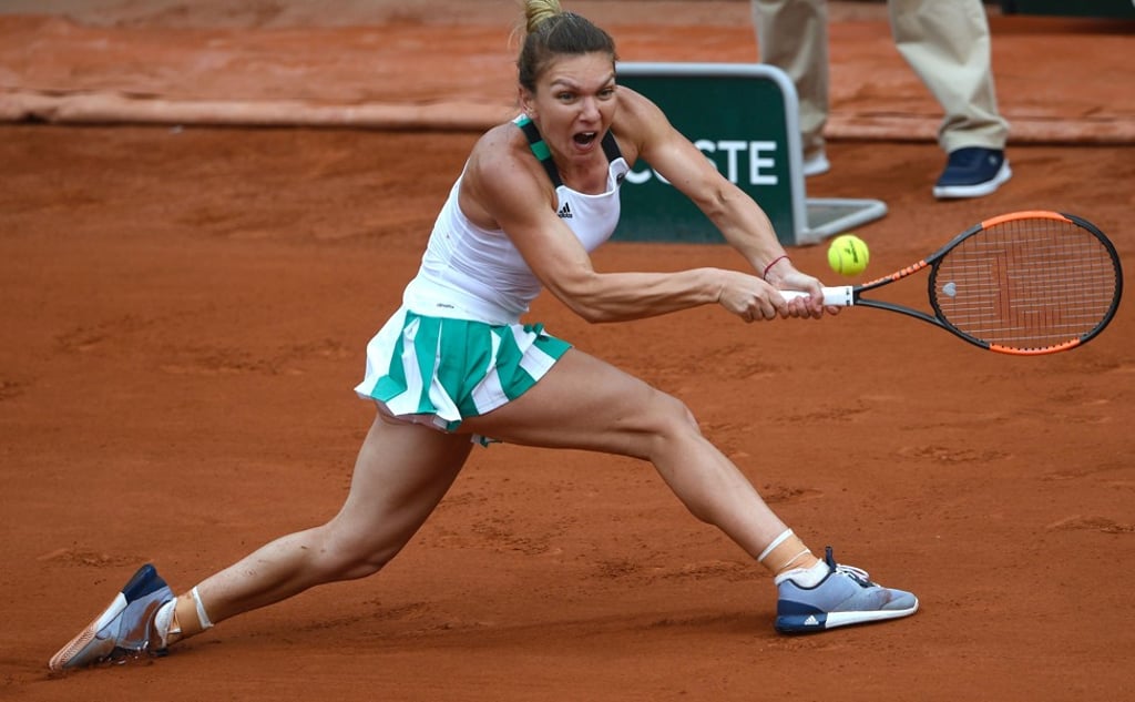 Halep returns the ball to Czech Republic’s Karolina Pliskova during their semi-final of the French Open. Photo: AFP