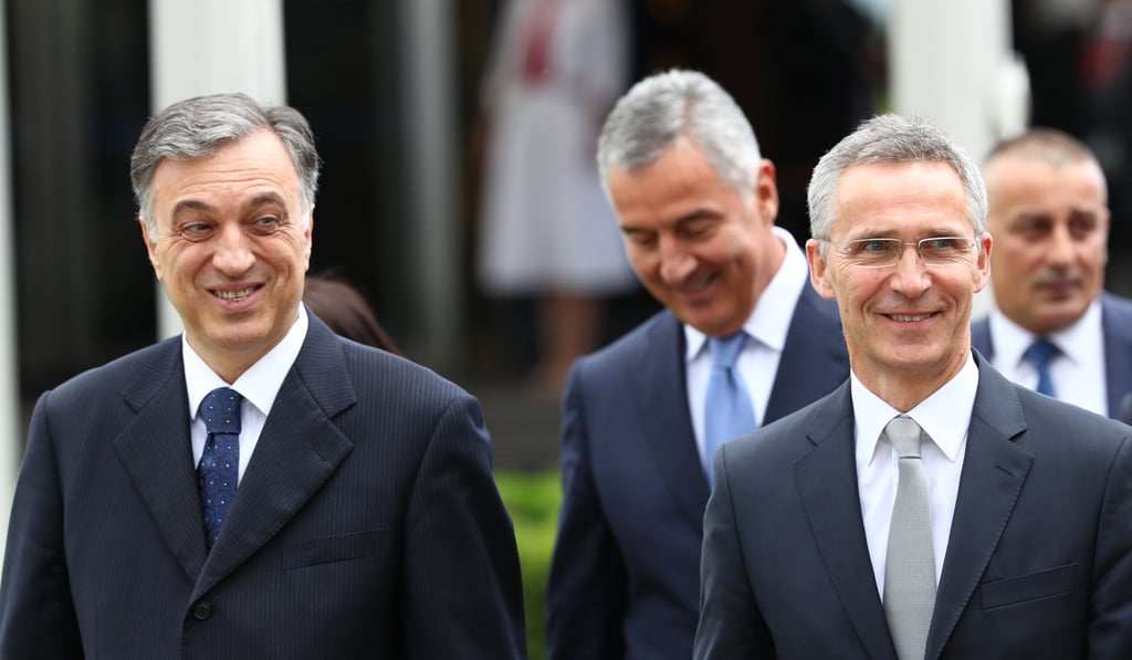 Montenegrin President Filip Vujanovic (L, front) and Nato Secretary General Jens Stoltenberg (R, front) attend a ceremony marking Montenegro's accession to Nato. Photo: Xinhua Montenegrin President Filip Vujanovic (L, front) and Nato Secretary General Jens Stoltenberg (R, front) attend a ceremony marking Montenegro's accession to Nato. Photo: Xinhua