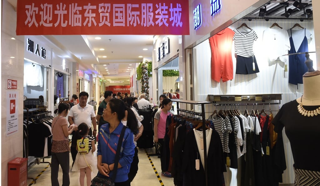 Consumers at Dongmao international clothing market in Yanjiao of Sanhe, Hebei province. Photo: Xinhua Consumers at Dongmao international clothing market in Yanjiao of Sanhe, Hebei province. Photo: Xinhua