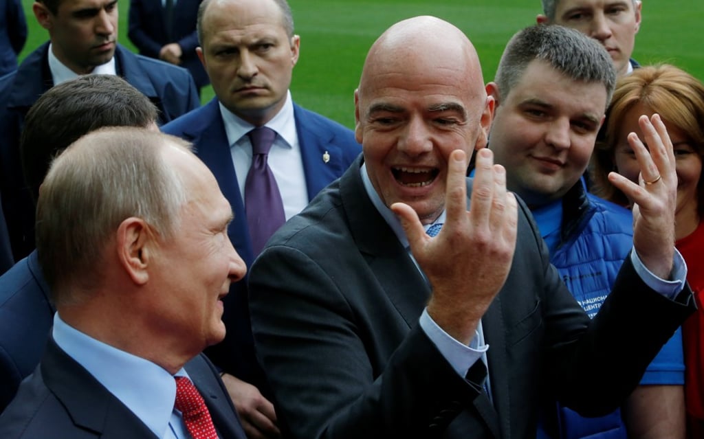Russian president Vladimir Putin met Fifa president Infantino last month ahead of the World Cup in Russia. Photo: Reuters