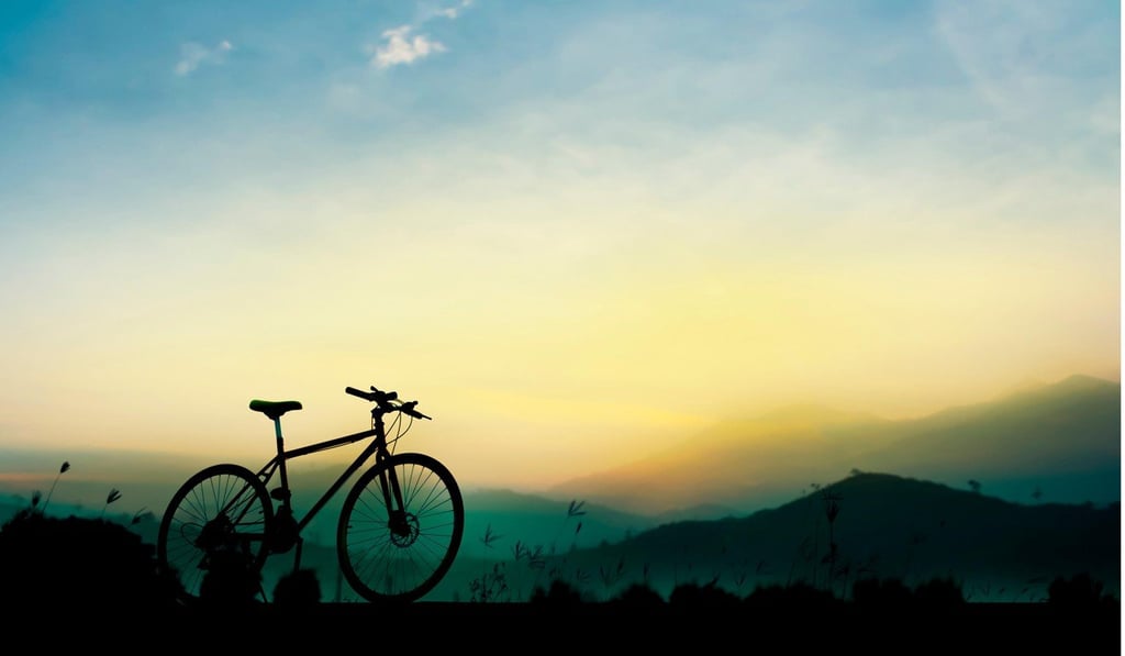For Elliot, luxury can simply be not having people or technology around him, such as on bike rides through the countryside. Photo: Alamy
