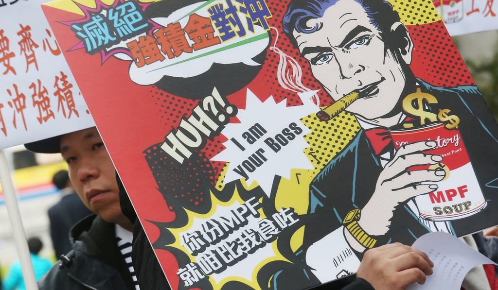 Members of the Hong Kong Federation of Trade Unions demand the scrapping of the MPF offsetting mechanism. Photo: David Wong