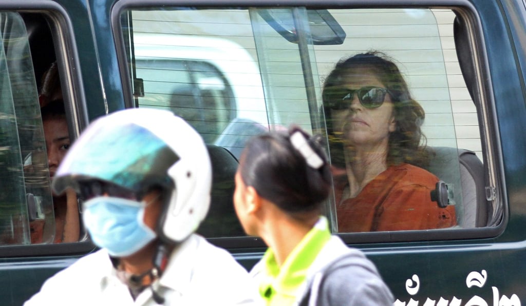 Australian national Tammy Davis-Charles (R), 49, sits in a prison car as she travels to Phnom Penh municipal court. Photo: AFP Australian national Tammy Davis-Charles (R), 49, sits in a prison car as she travels to Phnom Penh municipal court. Photo: AFP