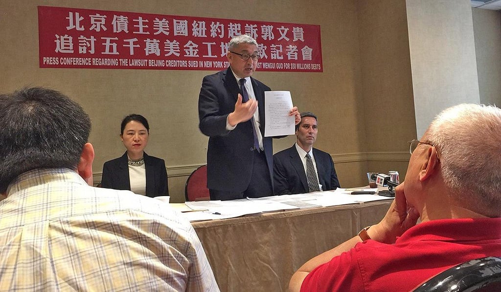 Represented by New York lawyer Kevin Tung (middle), nine plaintiffs are seeking more than $40 million in direct damages and $10 million in punitive damages. Photo: Robert Delaney Represented by New York lawyer Kevin Tung (middle), nine plaintiffs are seeking more than $40 million in direct damages and $10 million in punitive damages. Photo: Robert Delaney