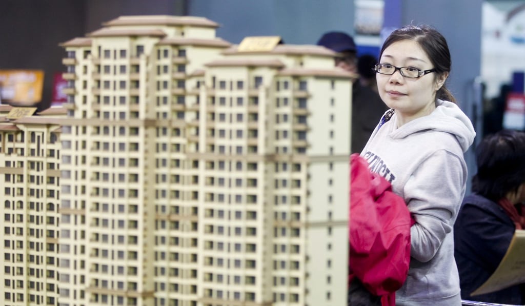 China’s major cities have raised down payment requirements, restricted purchases by non-locals and second-home buyers, as well as restricted lending to developers to rein in soaring home prices. Photo: EPA