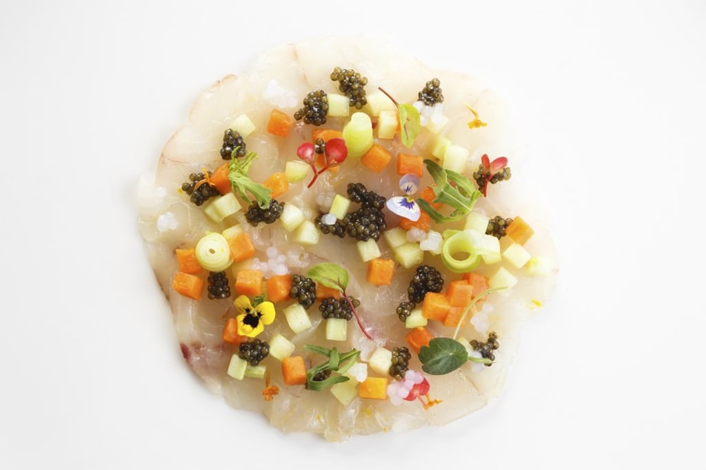 Sea bass carpaccio with caviar, papaya and cucumber from Angelini.