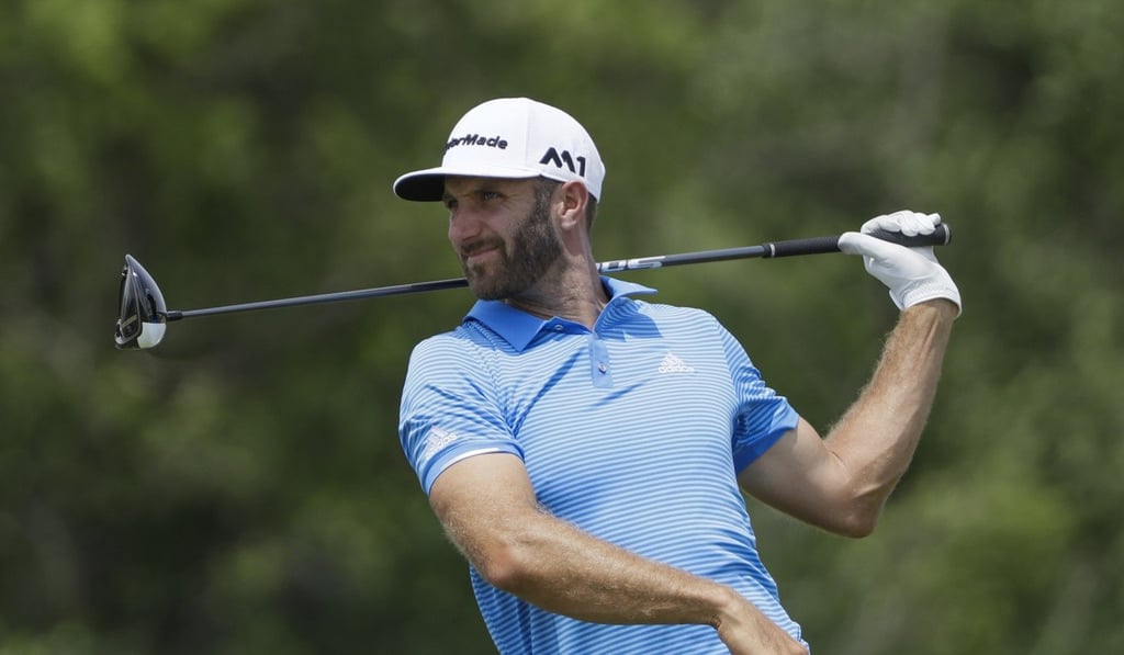 Dustin Johnson hits a drive on the 12th hole during a practice round for the U.S. Open at Erin Hills. Photo: AP Dustin Johnson hits a drive on the 12th hole during a practice round for the U.S. Open at Erin Hills. Photo: AP