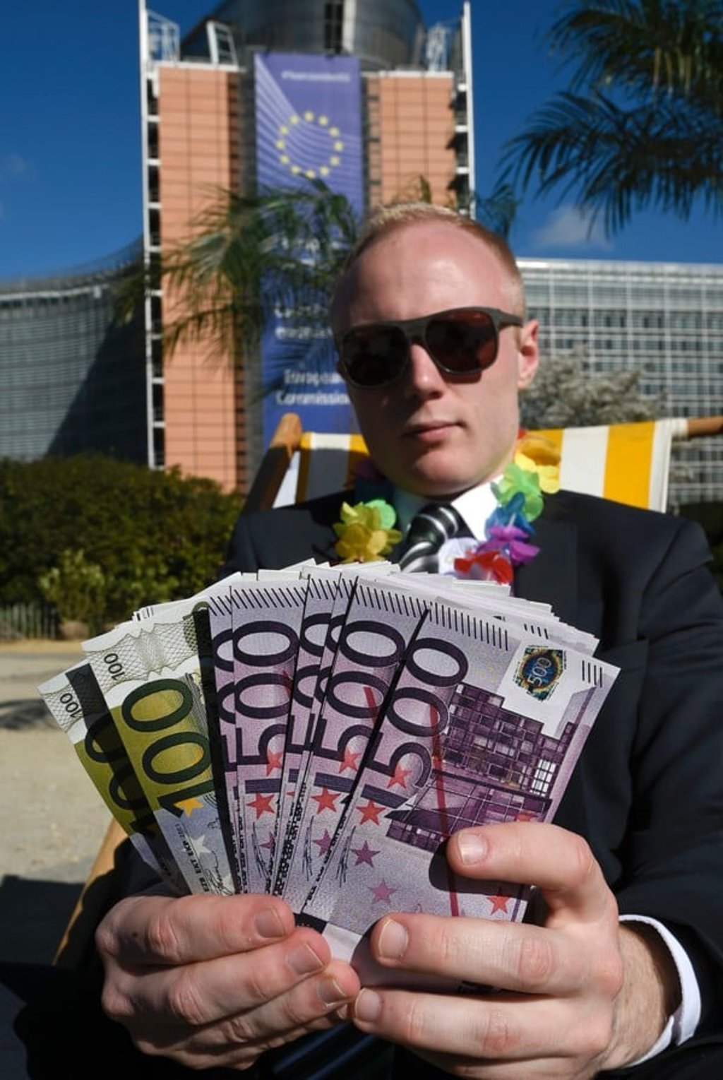 An activist protests in front of the European Commission headquarters in Brussels, following the Panama Papers revelations. Picture: AFP An activist protests in front of the European Commission headquarters in Brussels, following the Panama Papers revelations. Picture: AFP