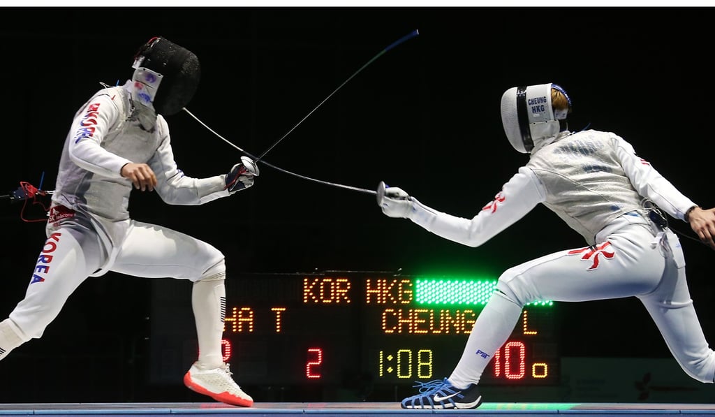 Hong Kong's Cheung Ka-long (right) in action against Ha Tae-gyu in the final.