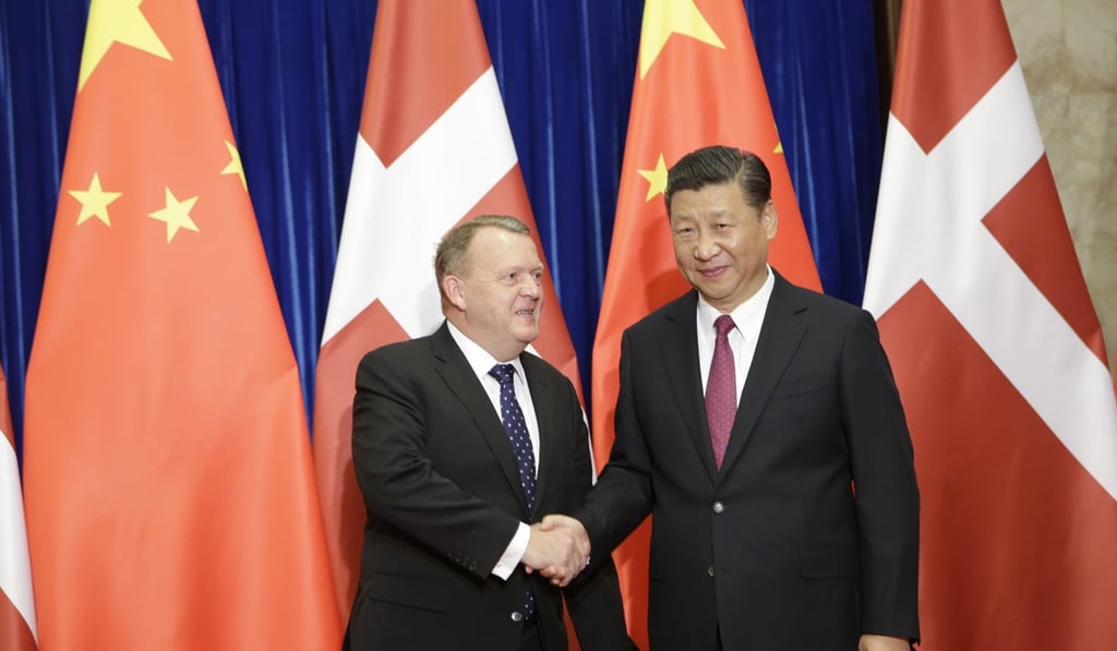 President Xi Jinping shakes hands with Denmark's prime minister, Lars Lokke Rasmussen, at the Great Hall of the People in Beijing in May. Photo: AFP/Pool
