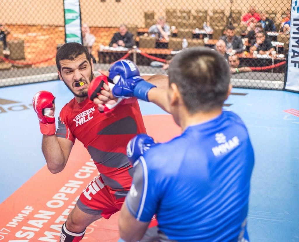 Imad Haoyek of Lebanon on his way to victory over Kudaibergen Toleubayev of Kazakhstan. Photo: Singaporemaven Imad Haoyek of Lebanon on his way to victory over Kudaibergen Toleubayev of Kazakhstan. Photo: Singaporemaven