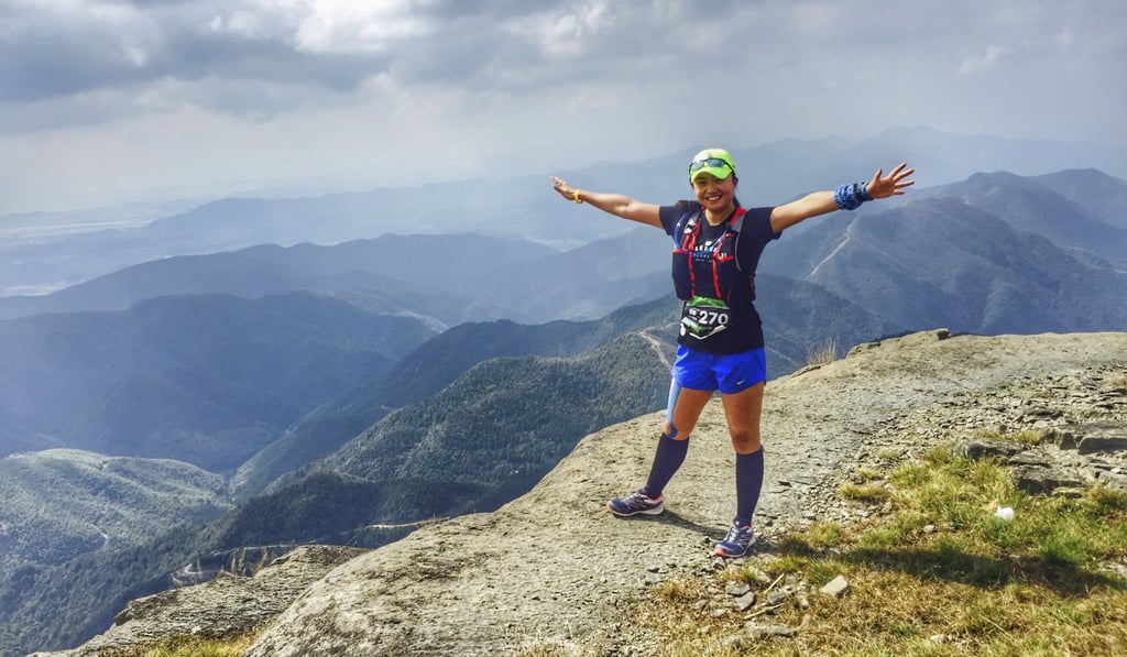 Runner and half-marathon organiser Zhao Qing takes a breather during a 50km trail race. Photo: Zhang Jin