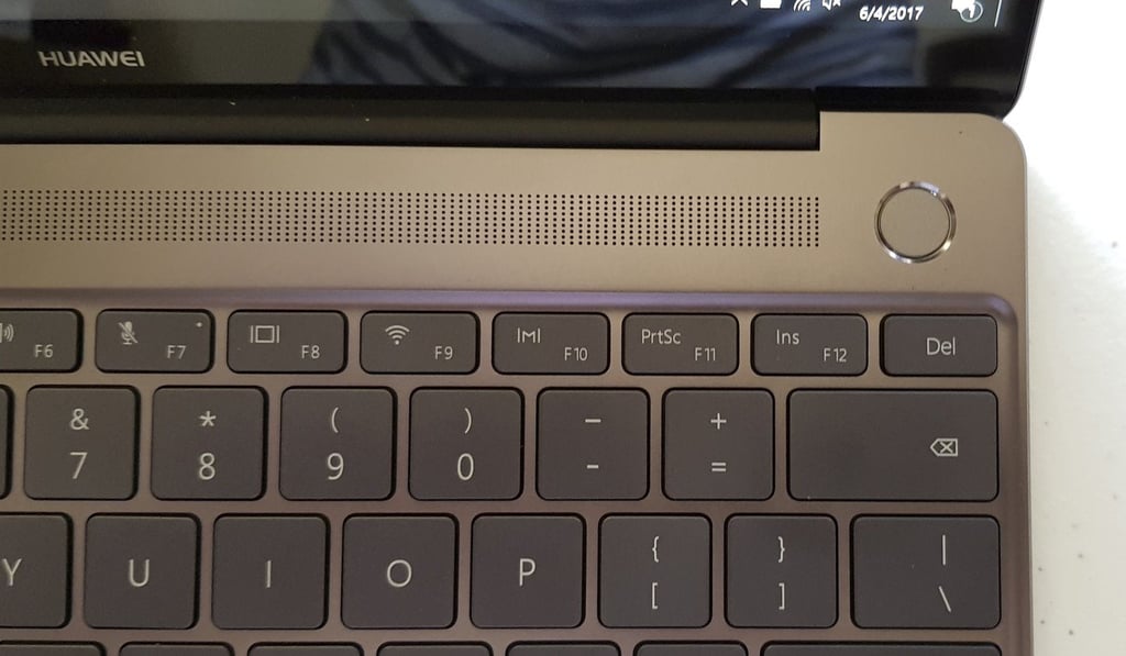 The Huawei MateBook X keyboard, Dolby Atmos speaker and power button that doubles as a fingerprint scanner. Photo: Ben Sin